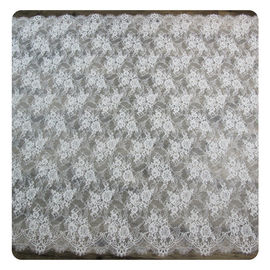 Normale orlato smerlato floreale dell'avorio di nylon che tinge il tessuto nuziale del pizzo del vestito fornitore