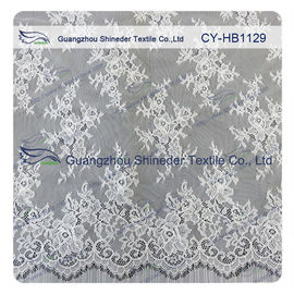 Vestito da sposa orlato smerlato floreale dal pizzo di Chantilly dell'avorio del nylon di 100% su misura fornitore