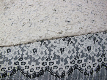 Rayon floreale del tessuto legato con corde del pizzo del ciglio materiale pesante bianco del pizzo/di nylon fornitore