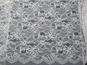 Floreale svizzero di nylon bianco del tessuto del pizzo tricottato con il pizzo del confine ed il bordo del pettine fornitore