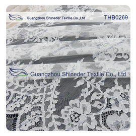 I fiori innumerevoli 3*1.5m graduano il tessuto secondo la misura del pizzo di chantilly del nylon di 100% per il vestito da sposa fornitore