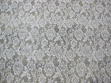 Disposizione del tessuto del pizzo del ciglio di W 100 cm con in rilievo su ordine materiale di nylon fornitore