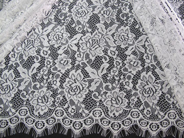 Disposizione del tessuto del pizzo del ciglio di W 100 cm con in rilievo su ordine materiale di nylon fornitore