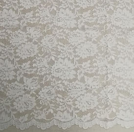 Tessuto nuziale di nylon del pizzo con il modello della foglia e del fiore fornitore