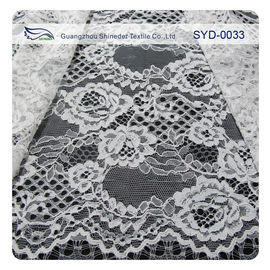 Il tessuto legato con corde del pizzo del fiore di Chantilly del vestito nero/ha ricamato il tessuto del pizzo fornitore