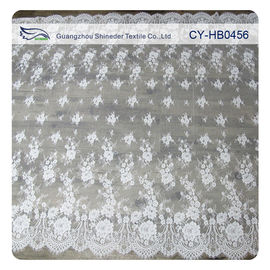 Abitudine floreale di nylon del tessuto del pizzo di Chantilly Embroideried dell'avorio stampata fornitore