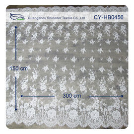 Abitudine floreale di nylon del tessuto del pizzo di Chantilly Embroideried dell'avorio stampata fornitore