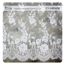 Abitudine floreale di nylon del tessuto del pizzo di Chantilly Embroideried dell'avorio stampata fornitore