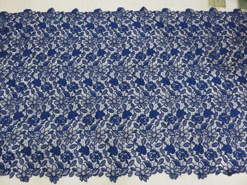 Lavoro manuale ricamato floreale del tessuto del pizzo del cavo del blu reale per il vestito dalla donna fornitore