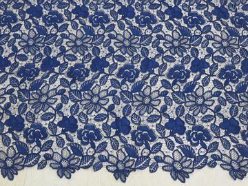 Lavoro manuale ricamato floreale del tessuto del pizzo del cavo del blu reale per il vestito dalla donna fornitore