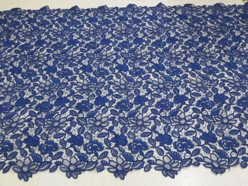 Lavoro manuale ricamato floreale del tessuto del pizzo del cavo del blu reale per il vestito dalla donna fornitore
